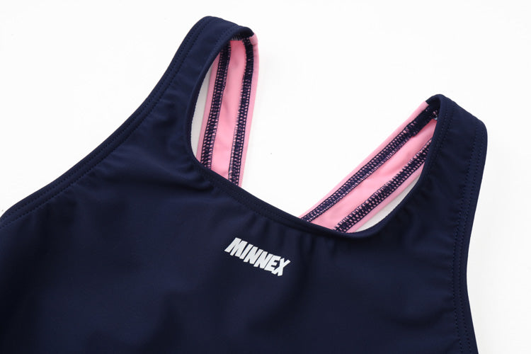 A close-up of the 寶藍色女童練習泳衣 <68400464-Y1>, made from 彈性布料, featuring pink and black striped inner straps and MINNEX printed in white on the front.