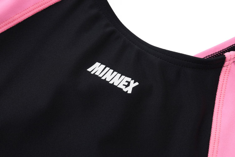 Close-up of a 藍色女童練習泳衣 <68401830-H2> featuring bold white MINNEX lettering on the chest and pink trim.