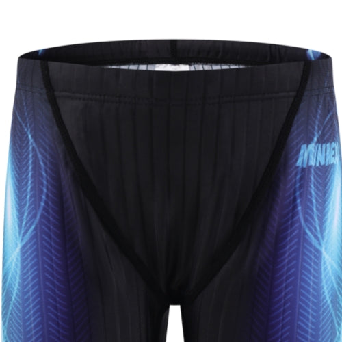 Close-up of the waist and upper thigh area of 黑色男童泳褲 <68331022> swim jammers, featuring a black and blue geometric pattern with faint white brand text on the right hip.