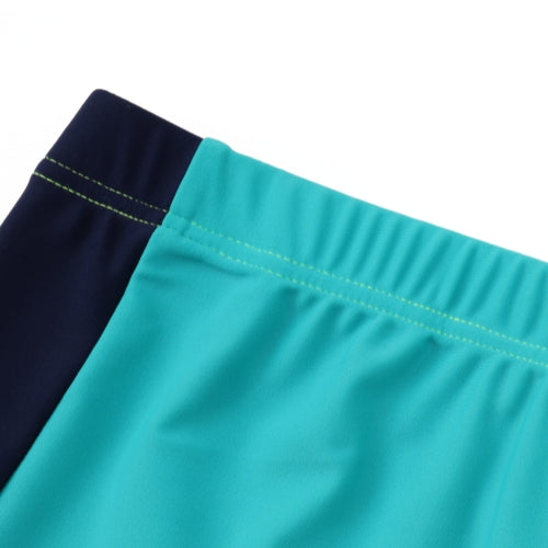 Close-up of a waistband featuring light blue and navy fabrics with visible stitching. The high-stretch material of 湖藍及膝童裝防曬褲 <81255-F8> ensures comfort and sun protection—ideal for active kids' swimwear.